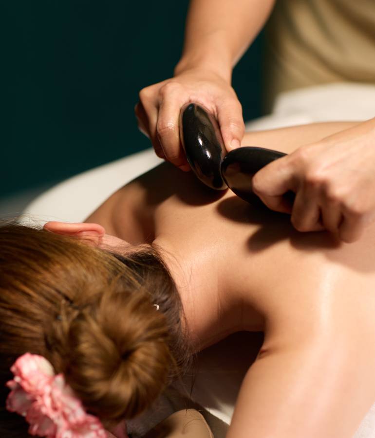 A Luxury Ritual: The Hot Stone Massage Experience